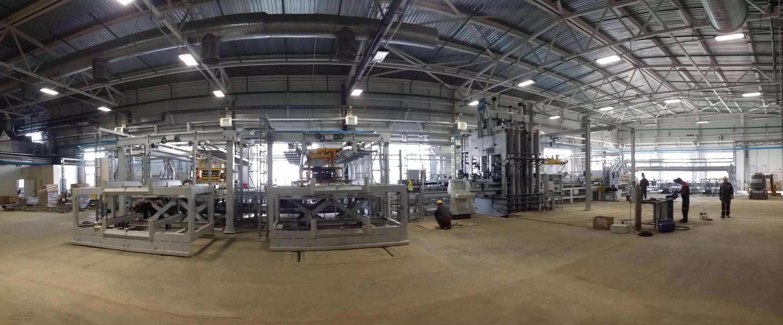 Монтаж линии ламинирования Wemhoner в условиях ограниченной высоты цеха Монтаж линии ламинирования Wemhoner в условиях ограниченной высоты цеха